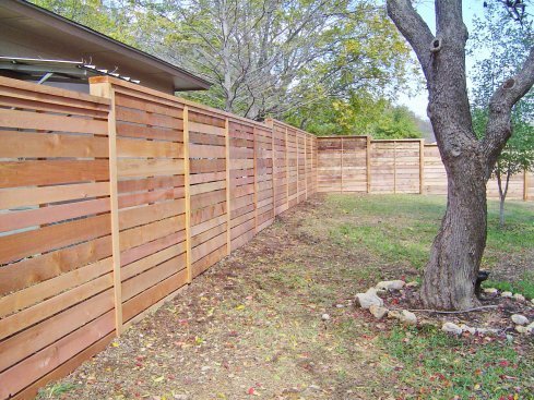 varying widths on horizontal fence