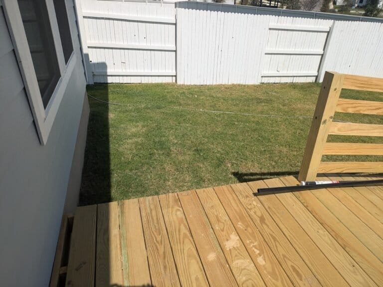 white fence in backyard